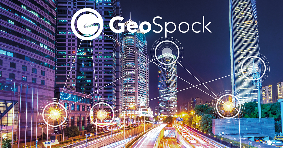 The city landscape at night with connected space-time analytics, representing GeoSpock DB, under the IMDA Spark Programme