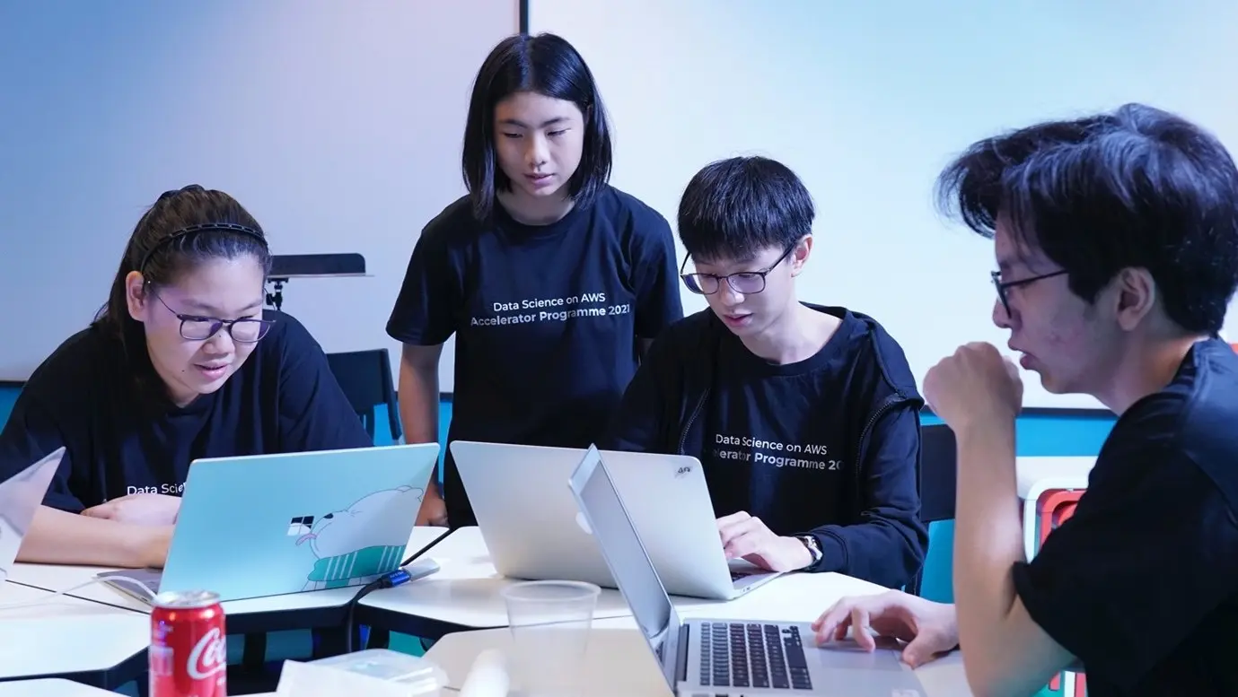 Young students participating in an AI BootCamp, a joint initiative by AWS and IMDA to nurture a passion in Singapore's youth