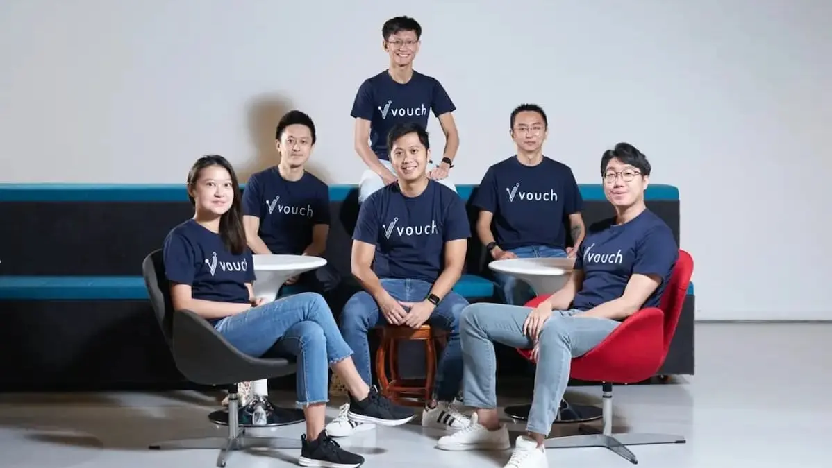 A group photo of Vouch's employees and founder, in collaboration with IMDA's Open Innovation Platform