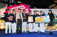 JC Circuit champion, Raffles Institution, on stage with RADM(NS) Ronnie Tay, IDA CEO (third from left)