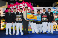 Secondary School Circuit champion, Raffles Institution, on stage with RADM(NS) Ronnie Tay, IDA CEO (fourth from left)