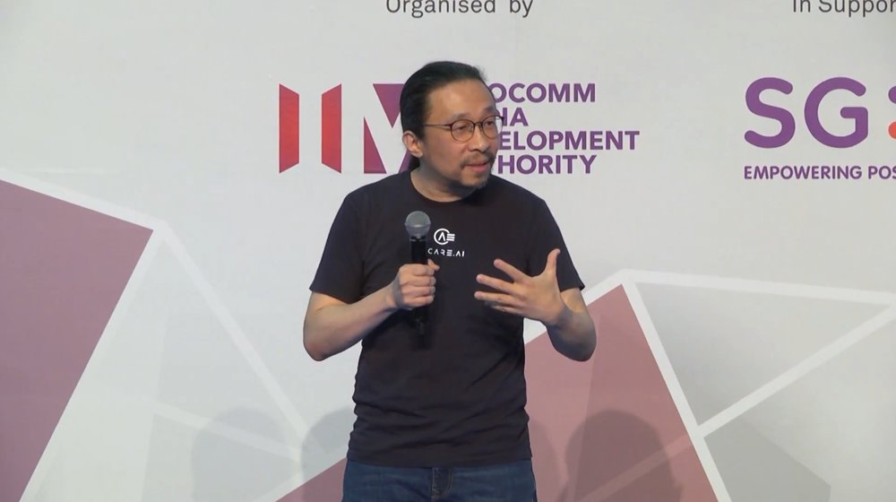 Mr Neal Liu, co-founder and CTO of UCARE.AI, speaking onstage at the 2019 Innovfest Unbound