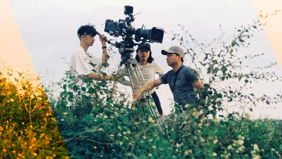 The film crew of Inside the Yellow Cocoon Shell, a Made with SG movie, at work on the set in a Vietnamese countryside.