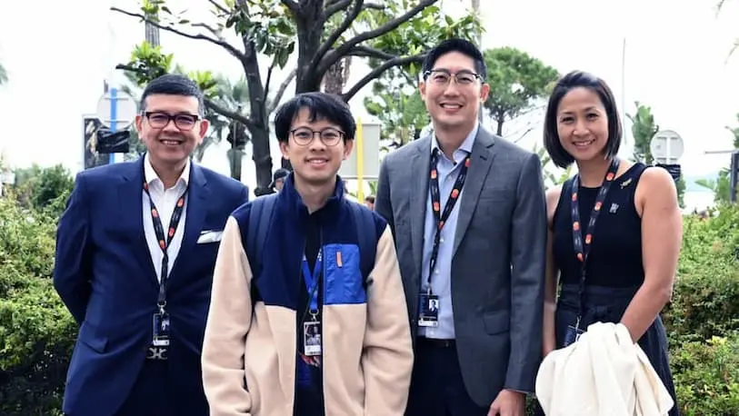 Jeremy Chua (second from left), Singaporean producer for the Made with SG film, Inside the Yellow Cocoon Shell, with IMDA executives at the 76th Cannes Film Festival. 