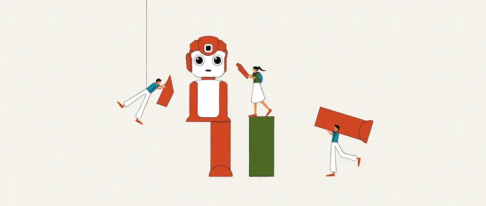 A group of people working on building a robot