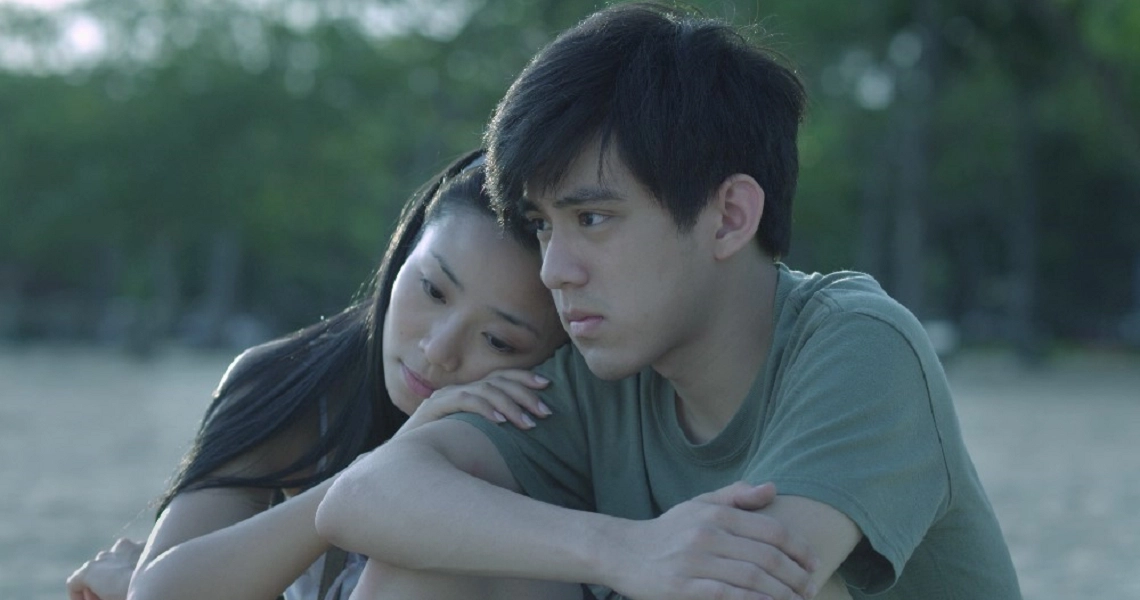 A scene from the Singaporean film 'Sandcastle', showing a contemplative moment in the coming-of-age story.
