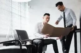 Two professionals in a discussion